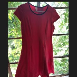 Pink tennis dress with black collar